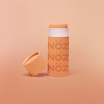 Load image into Gallery viewer, The vegan Nöz face sunscreen stick in the color orange
